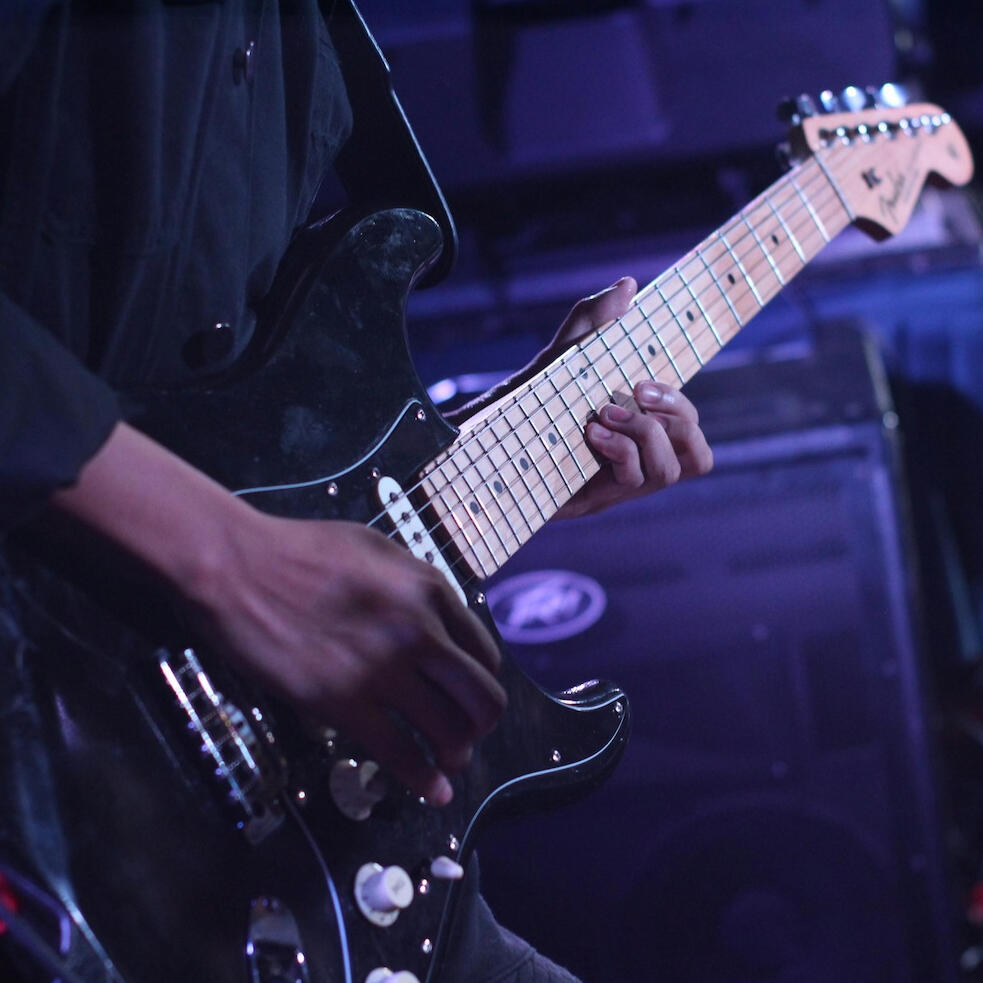 someone playing guitar