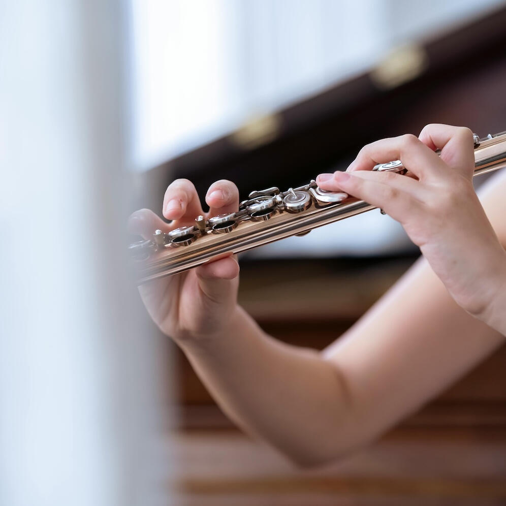 someone playing flute