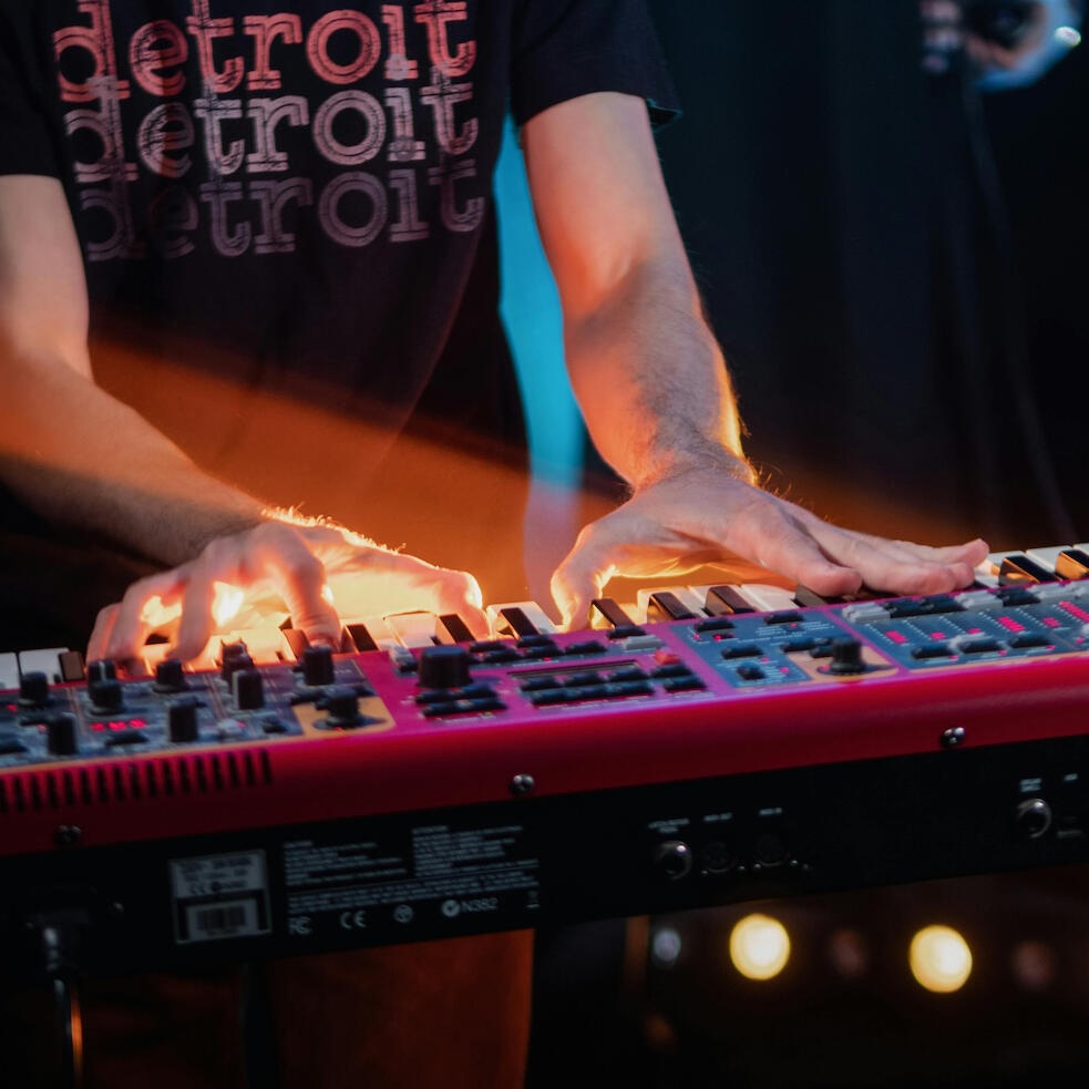 someone playing keyboard